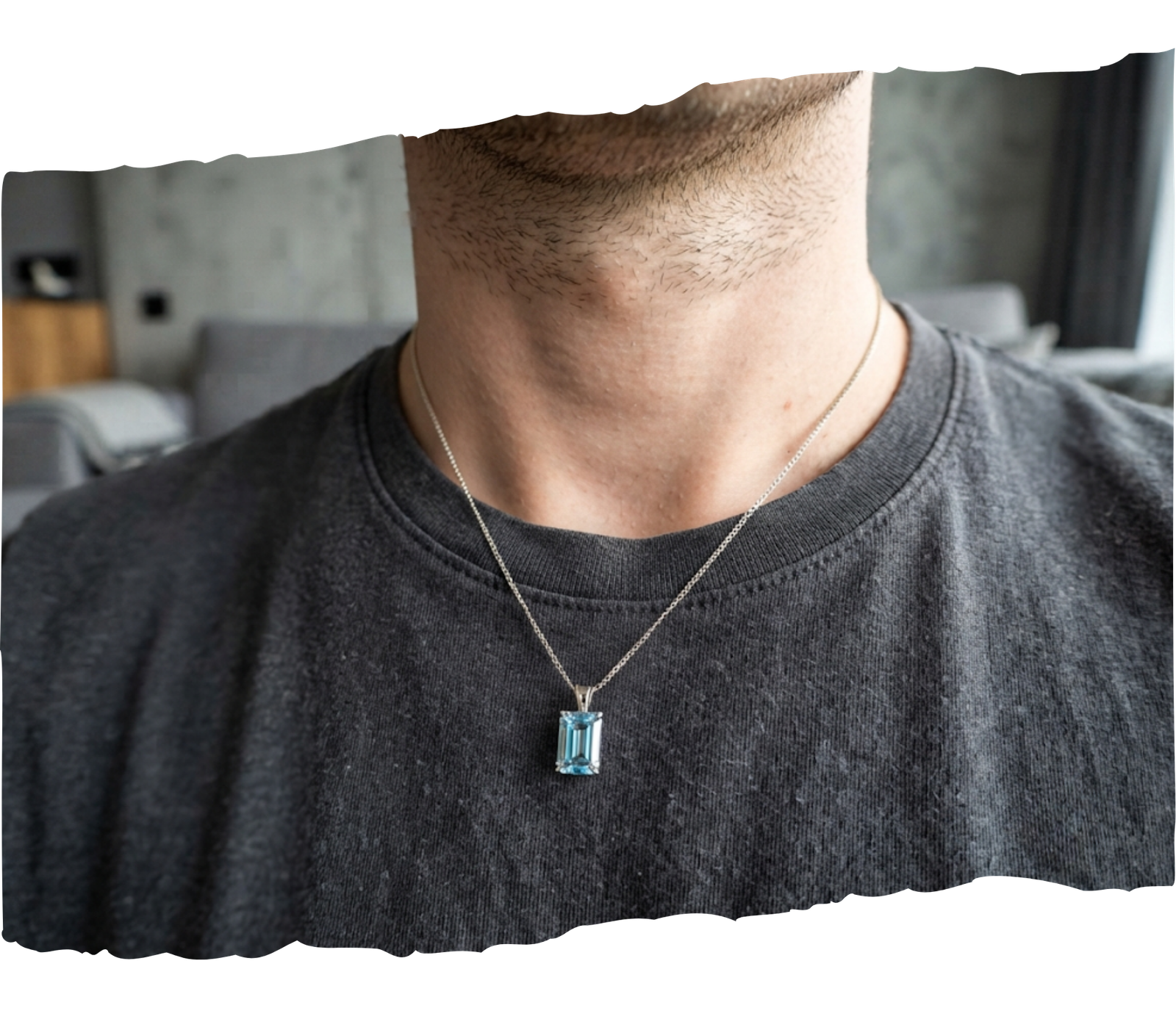 An emerald-cut blue memorial diamond pendant necklace worn around the neck, shared by customer Kevin P.