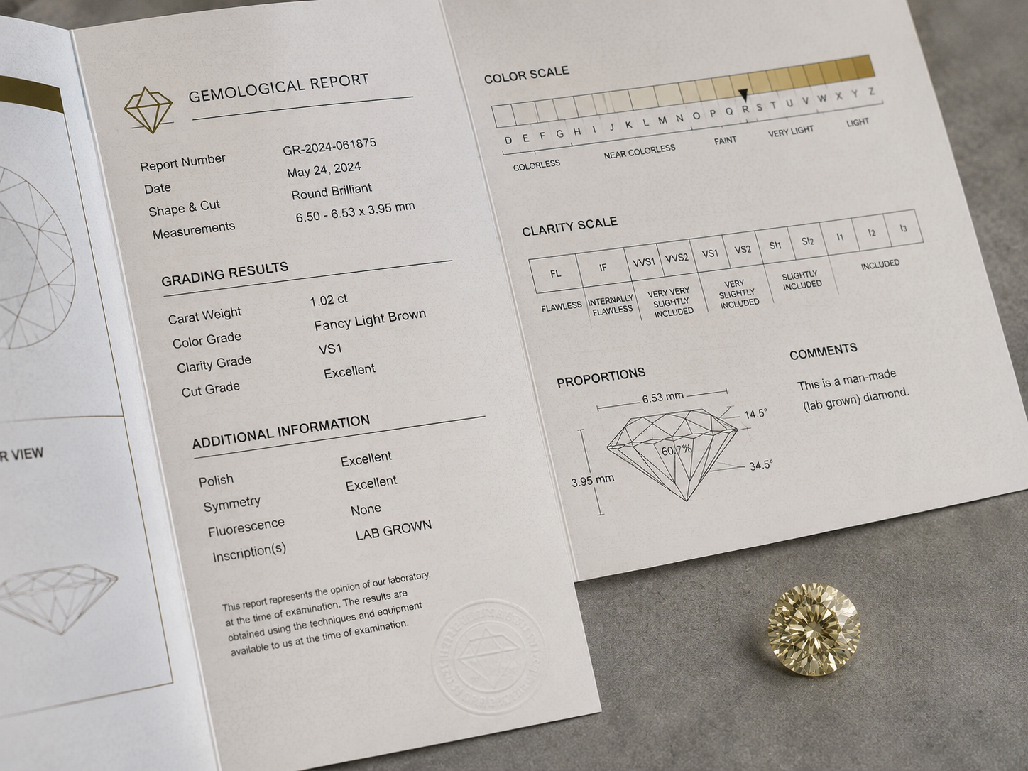 An independent diamond grading report open to the color grade section beside a loose memorial diamon