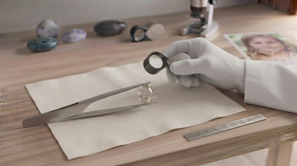A rough lab-grown diamond crystal held in tweezers under a gemologist's loupe before cutting
