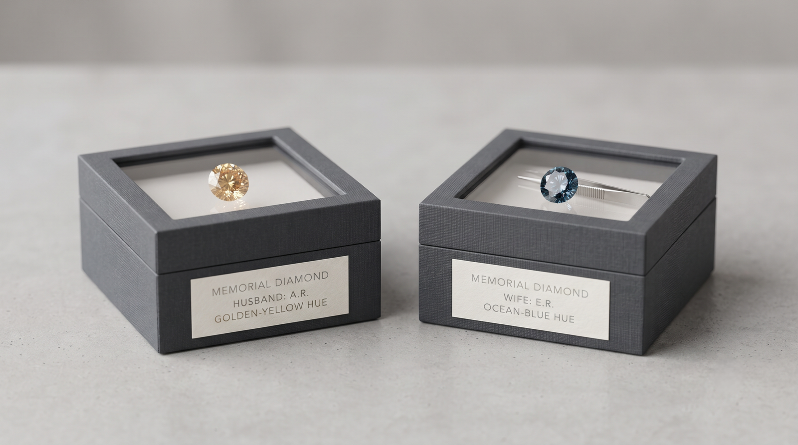 Two small loose memorial diamonds in separate labelled presentation boxes